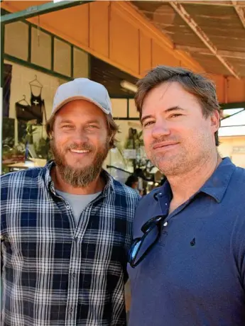  ?? Photo: Michael Nolan ?? SCOUTING LOCATION: Danger Close actor Travis Fimmel and film producer John Schwarz in the South Burnett town of Wooroolin for Anzac Day last week.