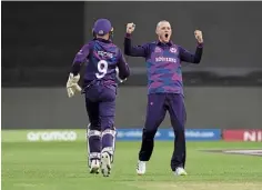  ?? ?? Michael Leask, right, celebrates at the T20 World Cup.