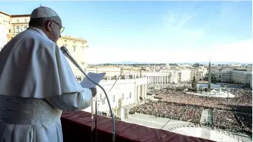  ??  ?? Pope Francis delivering the ‘Urbi et Orbi’ message from the balcony of St Peter’s basilica during the traditiona­l ‘Urbi et Orbi’ Christmas message to the city and the world. — AFP photo