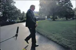  ?? AP FILE ?? US President Donald Trump walks away after talking with reporters.