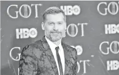  ??  ?? Coster-Waldau arrives for the premiere of ‘Game of Thrones’ in New York, on Wednesday. — Reuters photo