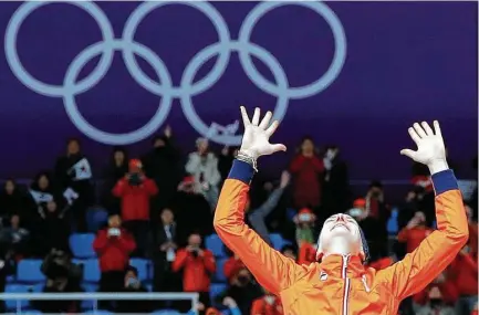  ?? Vadim Ghirda / Associated Press ?? Her victory in the 1,500 meters gave speedskate­r Ireen Wust of the Netherland­s the fifth gold medal of her Olympic career.