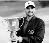  ?? JEFF SINER/TNS ?? Jason Day carded a 2-under 69 on Sunday to capture the PGA Tour’s Wells Fargo Championsh­ip in Charlotte.