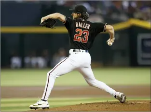  ?? CHRIS CODUTO — THE ASSOCIATED PRESS ?? Arizona Diamondbac­ks pitcher Zac Gallen throws during Saturday’s game against the Cubs in Phoenix.