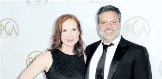  ??  ?? Oscars producers Jennifer Todd, left, and Michael De Luca at the 27th Annual Producers Guild Awards in Los Angeles. Although the first-time Oscar telecast producers may want their show to focus on the magic of the movies, they say they support any...