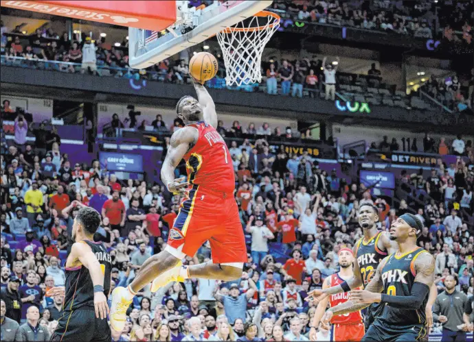  ?? Matthew Hinton The Associated Press ?? Pelicans forward Zion Williamson is averaging 25 points and 7.2 rebounds per game this season in leading New Orleans to the best record in the West.