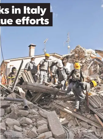  ?? ROBERTO SALOMONE, EUROPEAN PRESSPHOTO AGENCY ?? Workers in Accumoli and other quake- damaged Italian towns are staying in rescue mode, rather than switching to recovery, officials say.