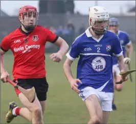  ??  ?? Ciarán Hourihane of Oylegate-Glenbrien beats Kevin Sheridan to the ball.