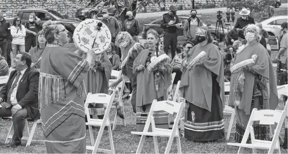  ?? DIANE CROCKER • THE TELEGRAM ?? Aboriginal women from around the area drummed and sang at the opening of the Mikwite’tm Garden outside the Qalipu First Nation offices in Corner Brook on Friday.