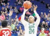  ?? JAMES CRISP/ASSOCIATED PRESS ?? Notre Dame's Arike Ogunbowale (24) shoots while defended by Ohio State's Shayla Cooper (32) on Friday.