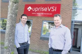  ??  ?? > UpriseVSI co-founders Gareth Rees Jones (managing director), left, and finance director Geoff Thomas