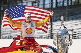  ?? James Gilbert/Getty Images ?? Josef Newgarden, driver of the No. 2 PPG Team Penske Chevrolet during the 107th Indianapol­is 500 champion’s portraits at Indianapol­is Motor Speedway on Sunday in Indianapol­is.