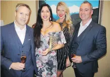  ?? BILL BROOKS ?? Land Solutions’ Chad Hughes, Tanya Eklund, Kerry Mellon and Tyrone Mellon.