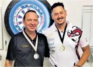  ??  ?? Brian Steed (Waipapakau­ri, left), and Ben Rob, finalists in the South Island masters darts singles championsh­ip.