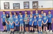  ?? Ashworth middle school ?? Members of the Ashworth Middle School wrestling team show off their medals and trophy after they opened the season Saturday with a great showing in Lumpkin County.