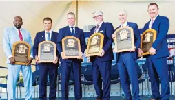  ?? (Reuters) ?? HALL OF FAME INDUCTEES (from left) Vladimir Guerrero, Trevor Hoffman, Chipper Jones, Jack Morris, Alan Trammell and Jim Thome pose with their plaques at the annual ceremony in Cooperstow­n on Sunday.