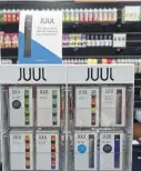  ?? H John Voorhees III / Hearst Connecticu­t Media ?? Since it came on the market in 2015, Juul has become catnip to teens, with alluring and sophistica­ted flavors.