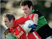  ??  ?? FOCUS: Derek Kavanagh (right) in action for Nemo Rangers against Strdabally in 2010