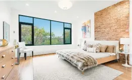  ?? COURTESY ?? A modern bed helps to create a sophistica­ted feel in this master bedroom.