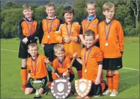  ??  ?? CHAMPIONS: Taynuilt shinty team won the P5 and under South of Scotland shinty championsh­ip held at Taynuilt on Sunday, Septem
ber 13, beating Bute 2-1 after extra time