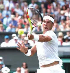  ?? — Reuters photo ?? Spain’s Rafael Nadal in action during the third round match against Australia’s Alex De Minaur.