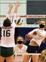  ?? DAILYTRIBU­NE.COM/SPORTS/MIPREPZONE ?? Lakewood’s Aubrey O’Gorman spikes the ball past the defense of Notre Dame Prep’s Grace Wenaas (16) during Thursday’s Division 2 semifinal volleyball match.