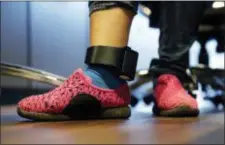  ?? ERIC GAY — THE ASSOCIATED PRESS ?? Ildra Medreano, an immigrant seeking asylum, wears an ankle monitor at a Catholic Charities facility not long after she was reunited with her son in San Antonio.