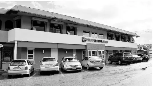  ??  ?? A branch of First Global Bank in Ocho Rios. FILE