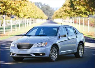  ??  ?? For price, safety and reliabilit­y, the Chrysler 200 (pictured here, the 2014 model) sedan is one of the best used cars for college student.