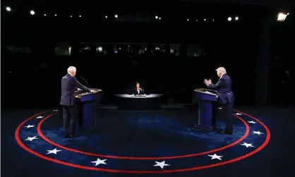  ?? Photograph: Bloomberg/Getty Images ?? Donald Trump and Joe Biden at a presidenti­al debate in Nashville, Tennessee, on 22 October 2020.
