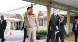  ?? AFPPIX ?? This photo taken by Dailynews on Monday shows Prayuth walking away, replaced by a cardboard cutout at Government House in Bangkok.