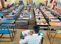  ??  ?? AT THE 12th standard examinatio­n conducted by the State Board of Secondary Education in Bhopal on June 10.