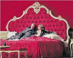  ??  ?? Guenther Groissboec­k, left, and Renee Fleming star in a performanc­e of Der Rosenkaval­ier. — METROPOLIT­AN OPERA FILES