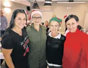 ?? Picture: SALVELIO MEYER ?? FEELING FESTIVE: Guests, from left, Nicola Smith, Chantal du Pisanie, Carol Hall and Nikki Moulton embraced the festive spirit by dressing up for the Wine to Door club’s Christmas dinner and tasting