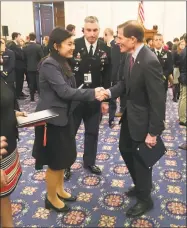  ?? Dan Freedman / Hearst Connecticu­t Media ?? Hearst Senate Youth Program participan­t Annie Wang, a senior at Cheshire High School, greets Sen. Richard Blumenthal at a Capitol Hill reception on March 7.