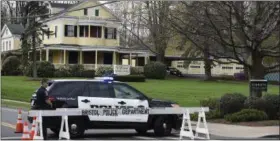  ?? JESSICA HILL — THE ASSOCIATED PRESS ?? Police block the street in front of O’Brien Funeral Home for the funeral of Aaron Hernandez, Monday in Bristol, Conn. The former New England Patriots tight end was found hanged in his cell in a maximum-security prison in Massachuse­tts.