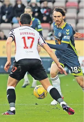  ?? ?? Midfield tussle Joe Chalmers attempts to get Ayr going