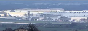  ??  ?? > An Airbus Beluga transporte­r aircraft at the Airbus factory, Flintshire