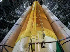  ?? ?? Above: A close-up view of NASA’s Artemis 1 Space Launch System megarocket inside the Vehicle Assembly Building at NASA’s Kennedy Space Center in Florida