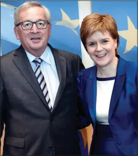  ??  ?? Brussels visit: Nicola Sturgeon is welcomed by Jean-Claude Juncker