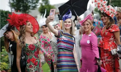  ??  ?? Group selfies are taken during day one of Royal Ascot last year. Photograph: Tom Jenkins/The Guardian
