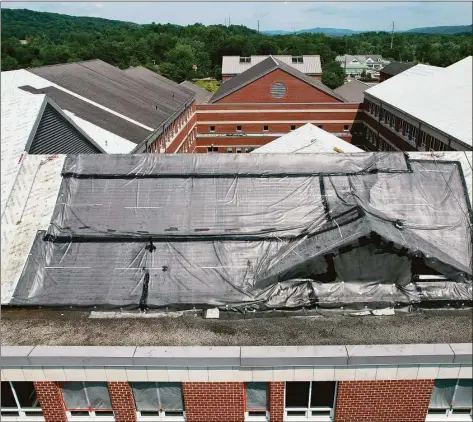  ?? Tyler Sizemore / Hearst Connecticu­t Media ?? The New Milford Town Council unanimousl­y approved a hot work ordinance on Nov. 28 to ensure better oversight for commercial projects and prevent accidents involving fire, such as the July roof fire at New Milford High School, from happening.