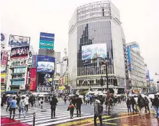  ??  ?? The famous “Shibuya Scramble Crossing”