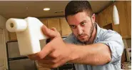  ?? Tribune News Service file ?? Cody Wilson shows the first completely 3D-printed handgun, The Liberator, at his home in Austin.