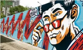  ??  ?? Agoncillo’s latest mural at the Makati-Mandaluyon­g Bridge