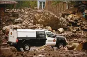  ?? AL SEIB / LOS ANGELES TIMES ?? A Santa Barbara County, Calif., sheriff’s vehicle patrols a neighborho­od Wednesday after a mandatory evacuation order was issued because of a powerful storm bringing record rainfall to the area.