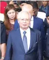  ?? REUTERS ?? MALAYSIA’s former Prime Minister Najib Razak leaves a court in Kuala Lumpur in this Oct. 4, 2018 photo.