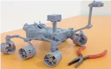  ??  ?? Hamad Al-Hendi’s 3D print of NASA’s Curiosity Rover which is operating on Mars.