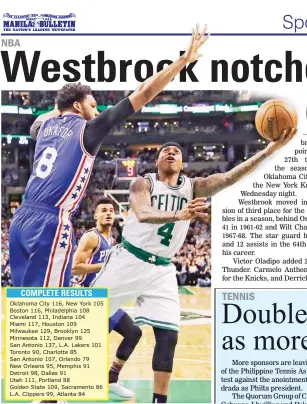  ??  ?? Boston Celtics guard Isaiah Thomas tries to score against Philadelph­ia 76ers center Jahlil Okafor during their NBA game in Boston. The Celtics won. 116-108. (AP)