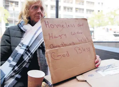  ?? SULLIVAN/GETTY ?? “If your purpose is to assuage your feelings of guilt for having comforts they do not, and you don’t care about being part of a codependen­t system, I could understand giving cash on the street,”said a former executive director of homeless shelters in our area.“If your purpose is doing good for others, your money would go a lot further, and buy more meals or bed-nights if given to a good charity.”JUSTIN